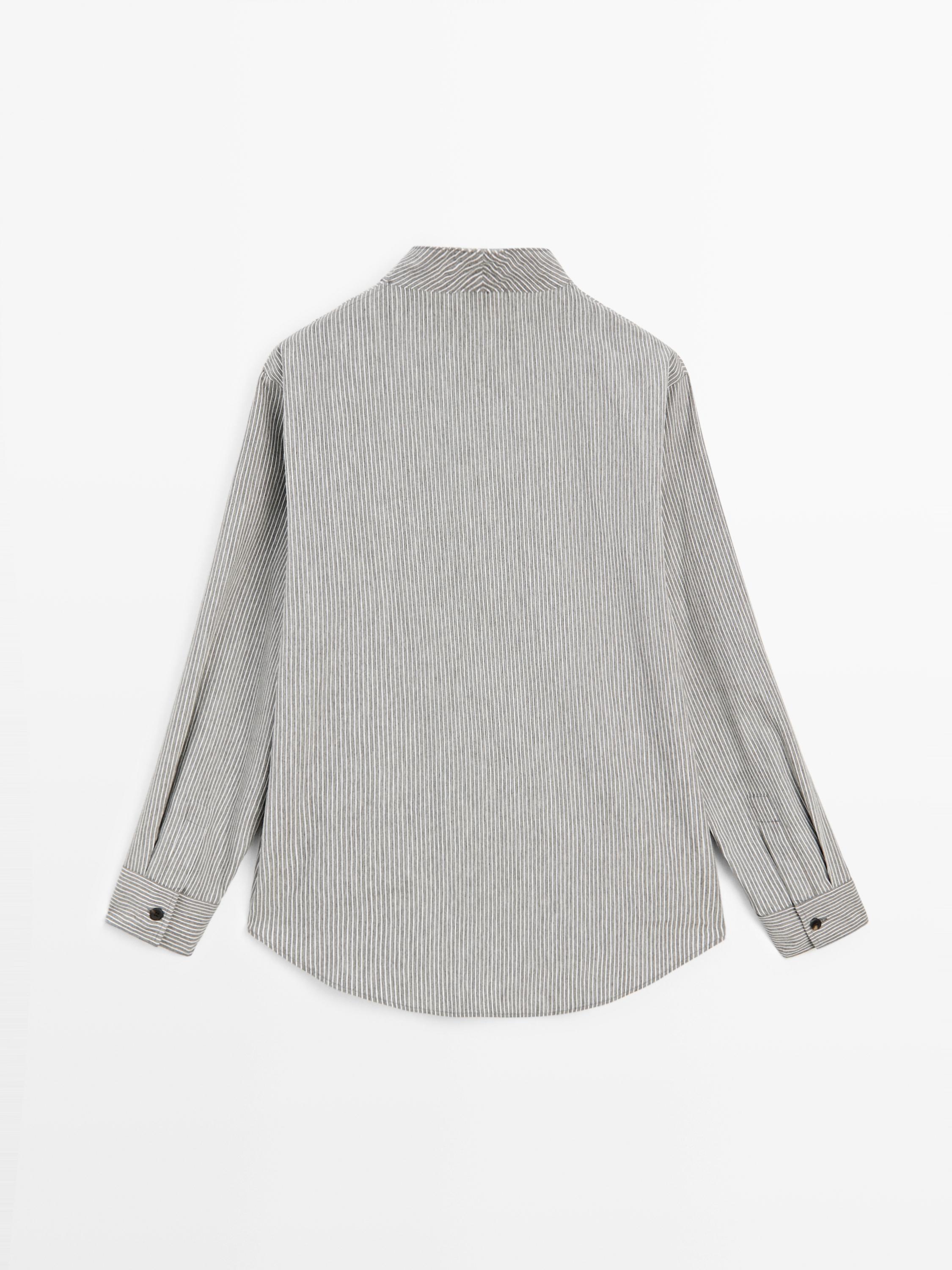 Striped flowing shirt with button details